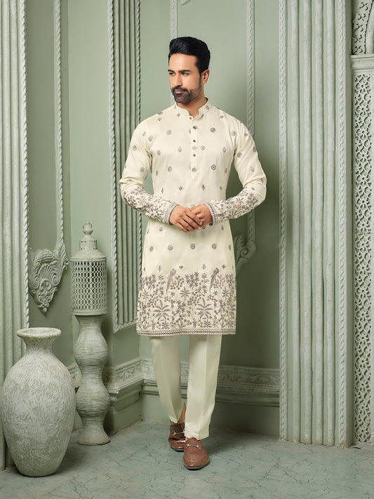 Off white silk kurta set with threaded Daman & embroidery work